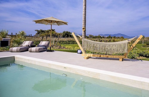 Tingaki Villa | TAF Beach Villas with Tesla