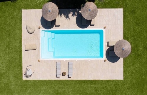 Asgourou Villa | Elegant Rhodes Villa | Villa Themis | 5 Bedrooms | Private Pool | Furnished Terrace | Modern Design and Stylish Amenities | Parking Area | Koskinou