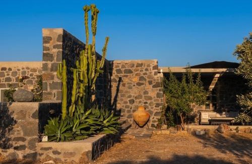 Nisyros Apartment | Pavlaina Complex of Traditional Residences in Nisyros. Enjoy the garden and the Sea View
