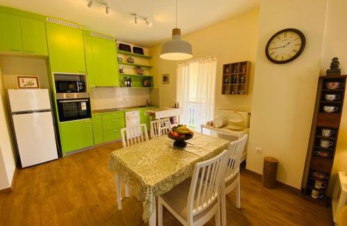 Agia Paraskevi Apartment | Wonderful Garden #1, 120 sqm with a large terrace, 3 bedrooms, comfortable, quiet, and upscale neighborhood, close to the subway, free parking, 15 minutes direct to Athens Airport